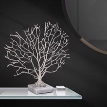 Study of Coral Sculpture On A White Marble Base